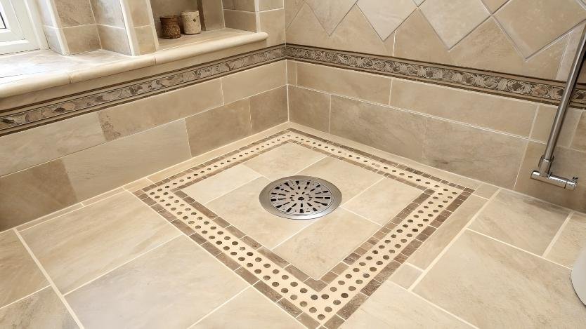 "Traditional bathroom installation with center drain and smaller format tiles"