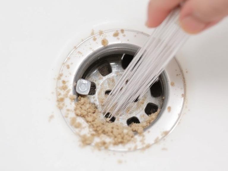 Remove Visible Debris to Unclog a Shower Drain Naturally