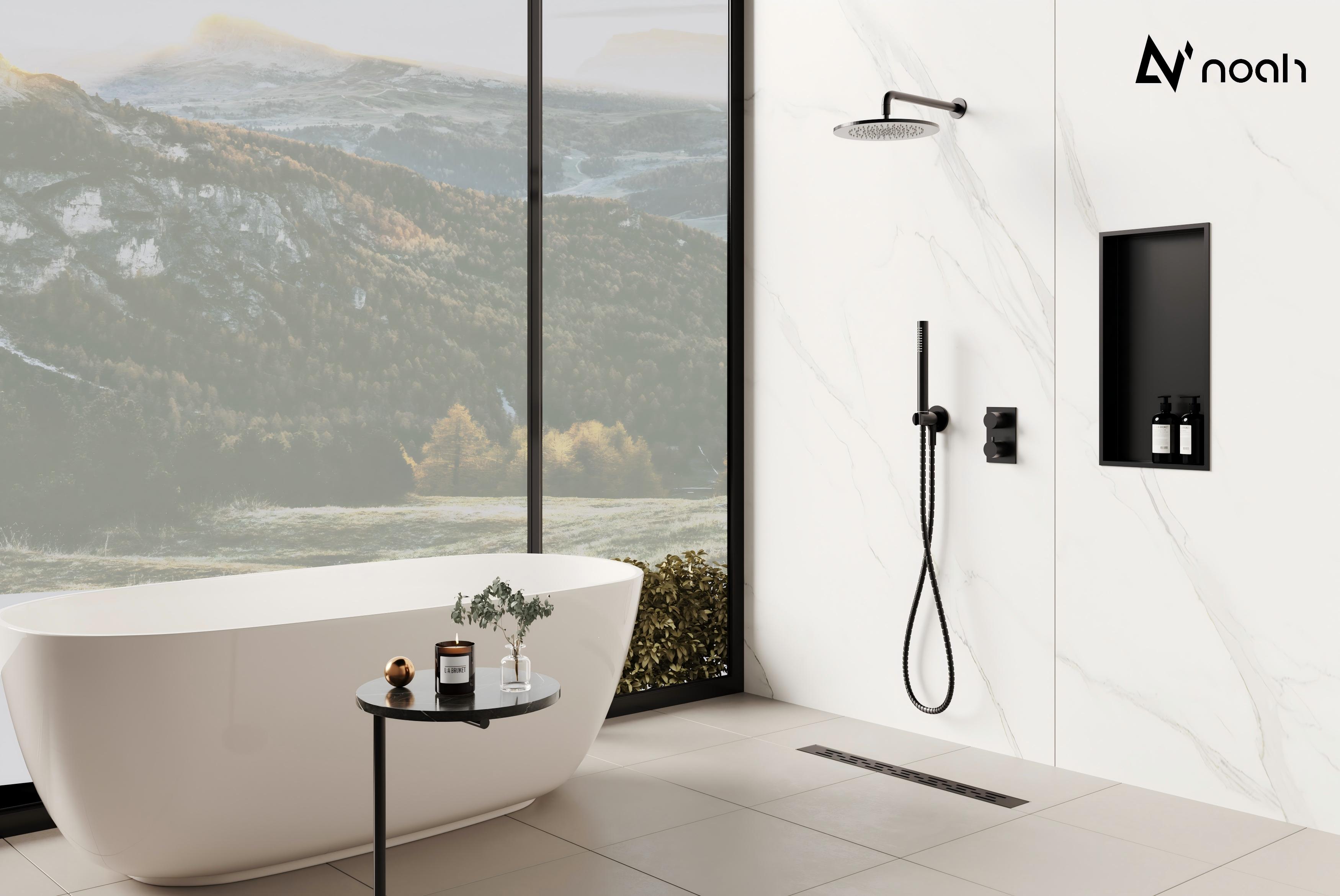 Stainless steel linear shower drain installed in a modern bathroom