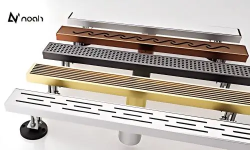 "Close-up of linear drain with decorative grate options in various finishes"