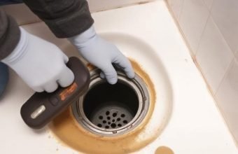 Clean the Opening for Removing the Old Shower Drain Clean the Opening for Removing the Old Shower Drain
